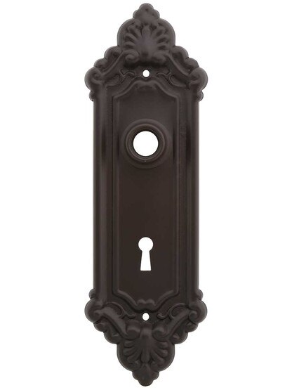 Stamped Brass French-Baroque Back Plate with Keyhole in Oil-Rubbed Bronze.